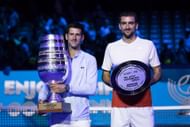 Novak Djokovic (left) and Marin Cilic (right) posing with the men's singles champion and runner-up trophies respectively at the 2022 Tel Aviv Watergen Open (Source: Getty)